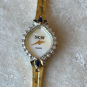 Vintage Armitron Now mother’s of pearl diamonds face  Women Watch